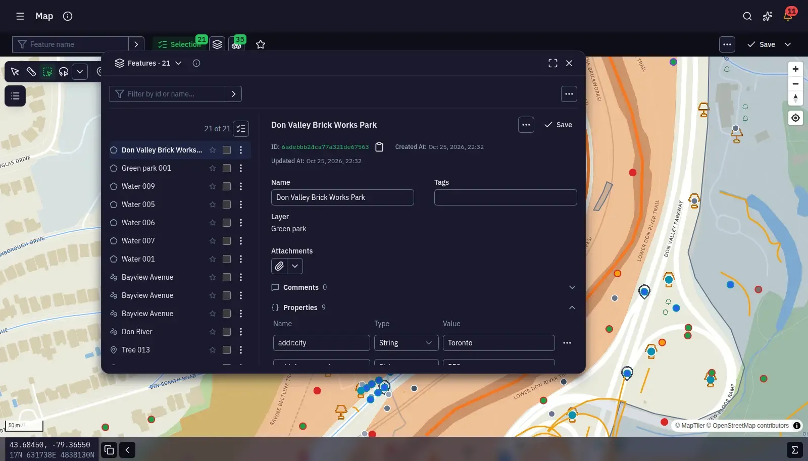 Features selected across layers, each with its properties beside the map