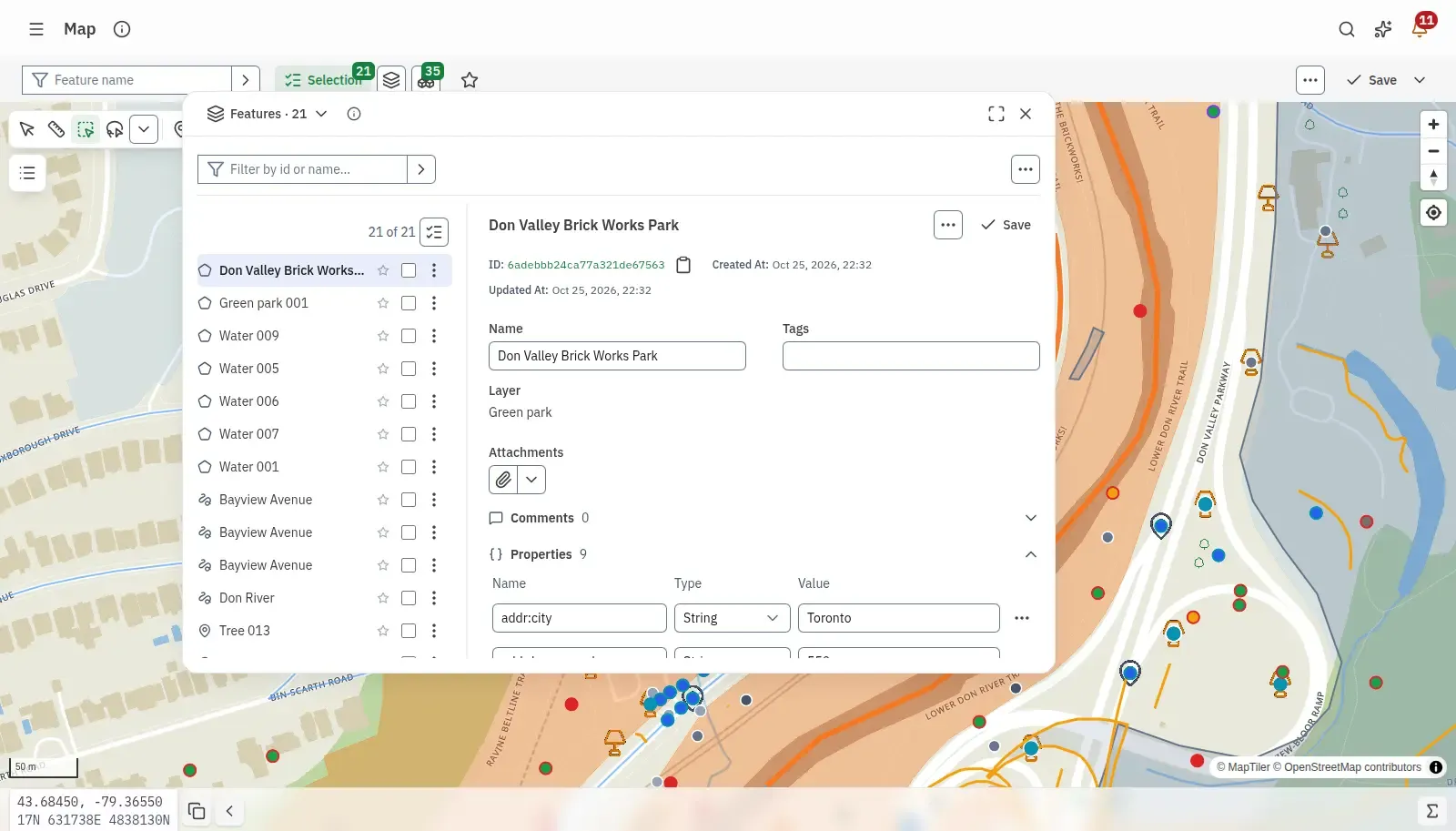 Features selected across layers, each with its properties beside the map